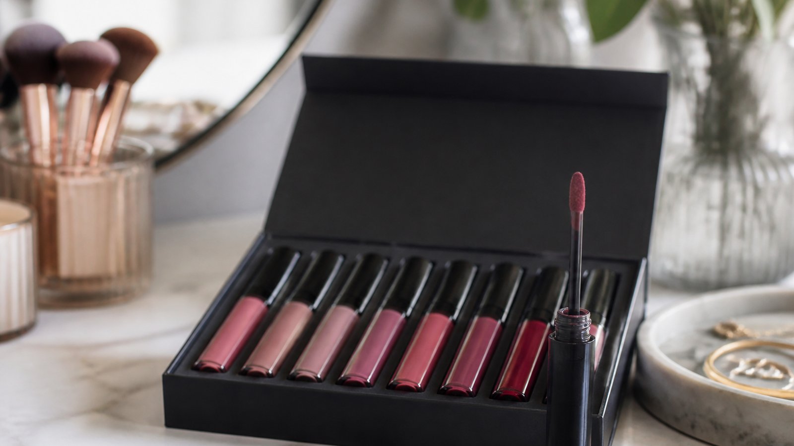 Eight-piece matte liquid lipstick set on a UK vanity