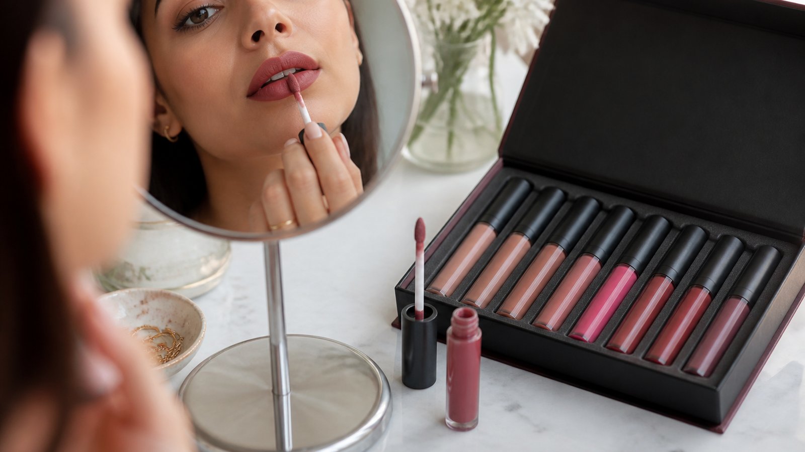 Eight-piece matte liquid lipstick set on a UK vanity