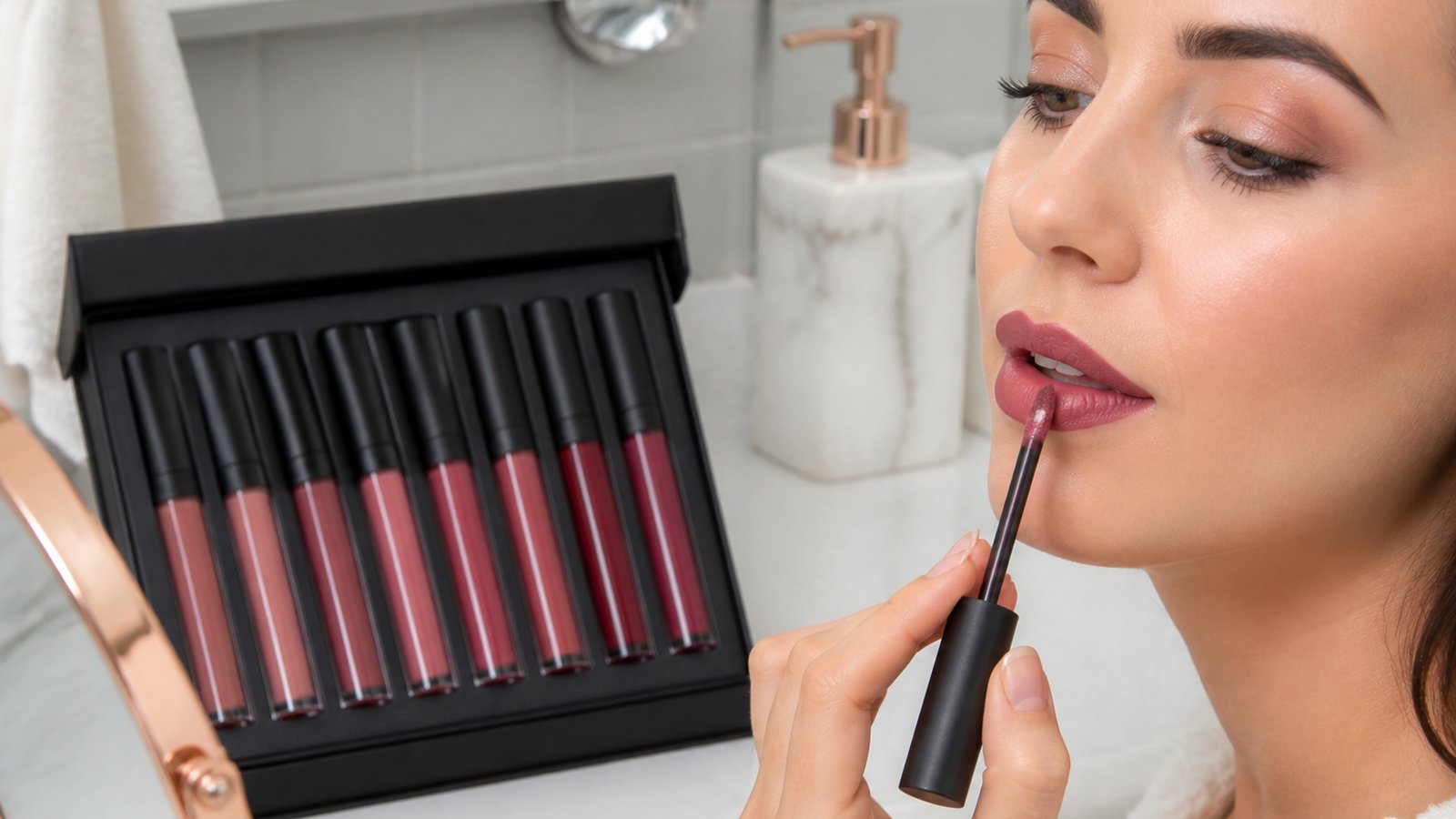 Doe-foot matte liquid lipstick applicator on a clean vanity