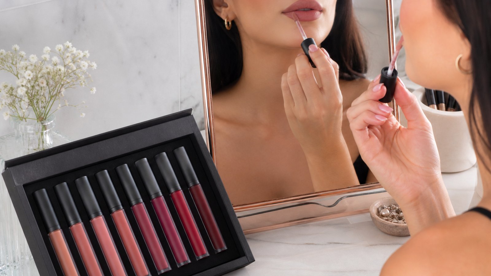 Doe-foot matte liquid lipstick applicator on a clean vanity